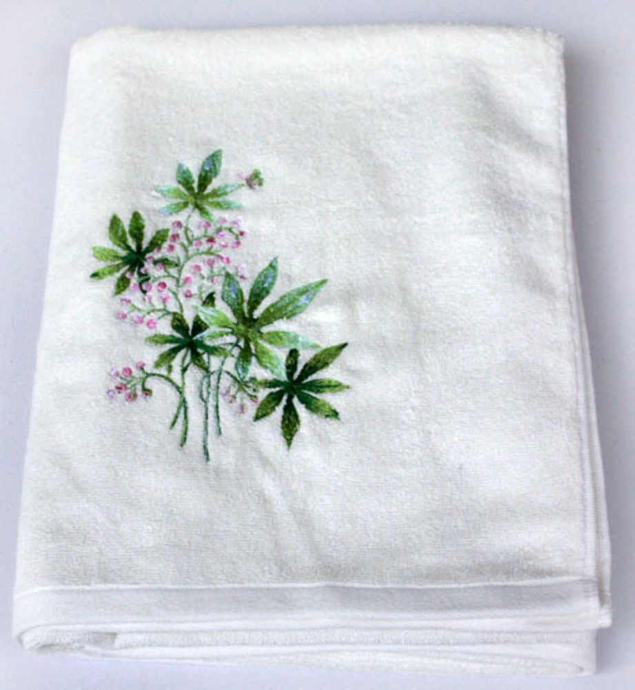 Embroidered white bath towels